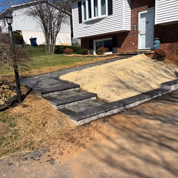 Lawn care and landscaping project by Tim's Outdoor Services