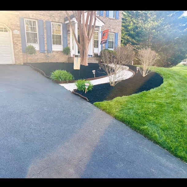 Lawn care and landscaping project by Tim's Outdoor Services