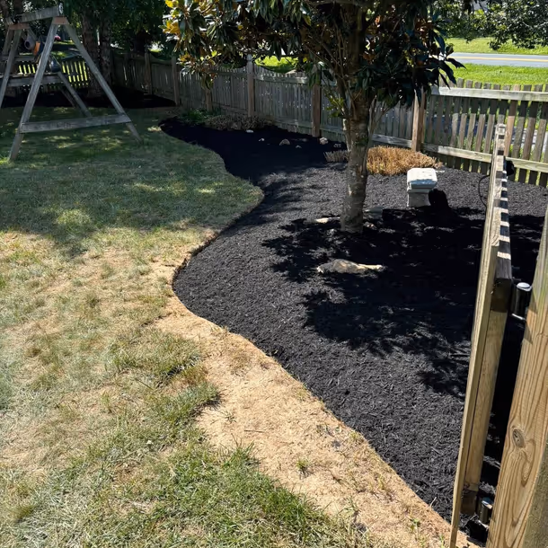 Lawn care and landscaping project by Tim's Outdoor Services