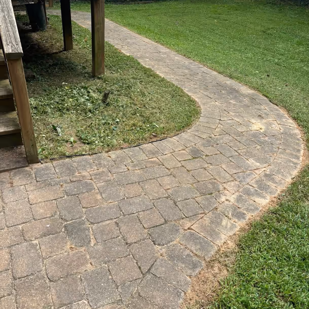 Lawn care and landscaping project by Tim's Outdoor Services