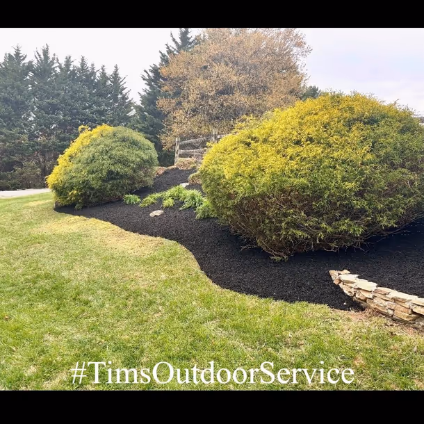Lawn care and landscaping project by Tim's Outdoor Services